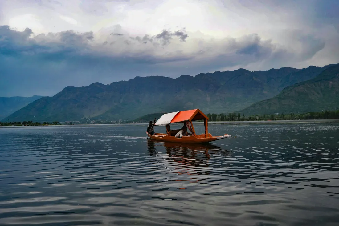 Shikara crossing Dal Lake in Srinagar